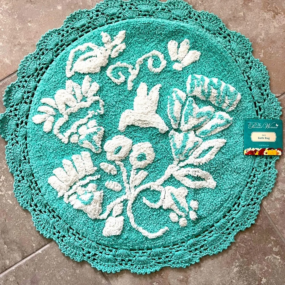 The Pioneer Woman “Mazie” round bath rug.